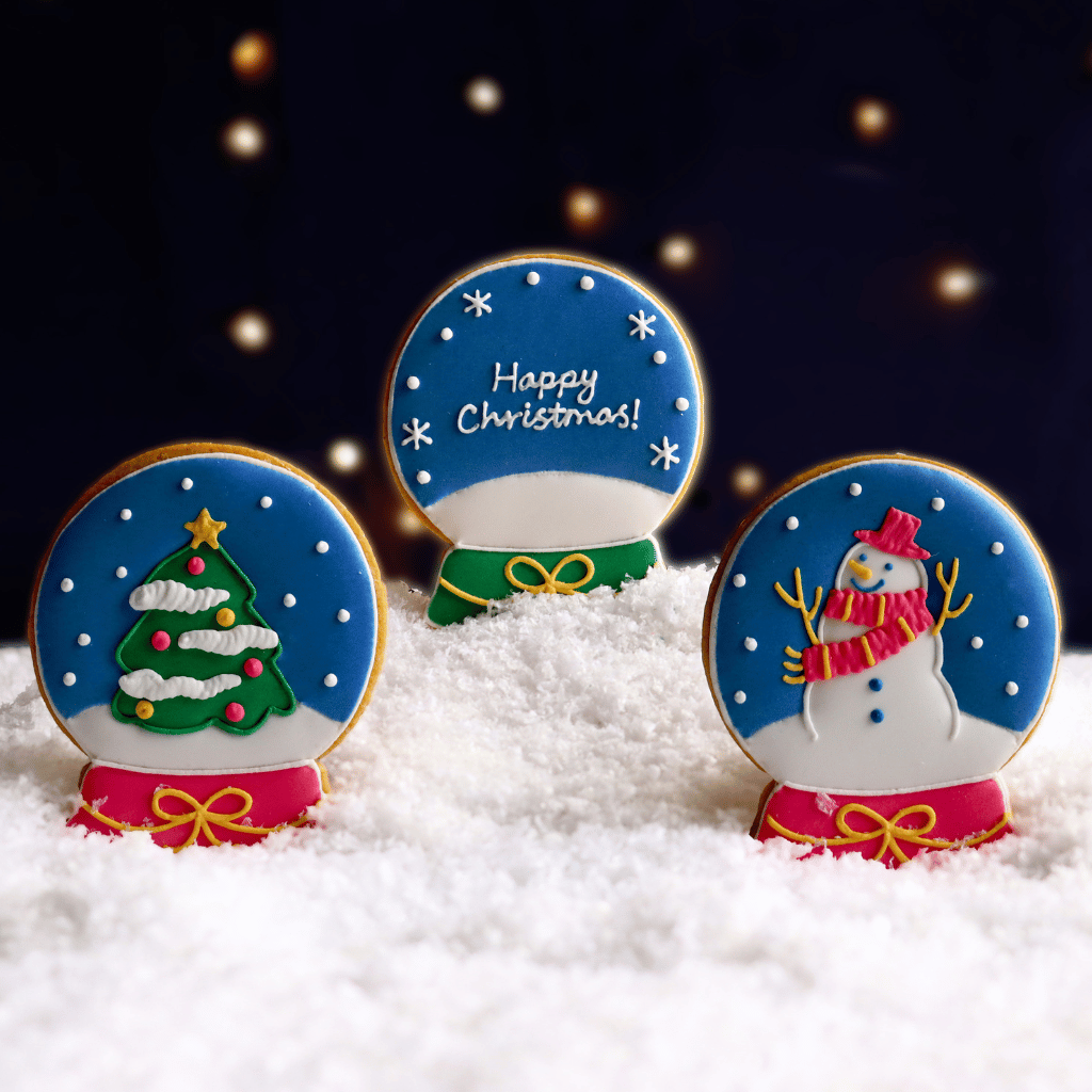 Thumbnail: Snowglobe biscuit trio Image 1